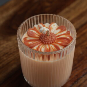 Peach Daisy Candle – Handcrafted Floral Candle in Ribbed Glass